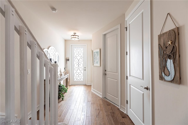 entryway with wood-type flooring