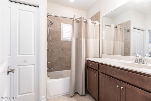 bathroom featuring vanity and shower / bath combo with shower curtain