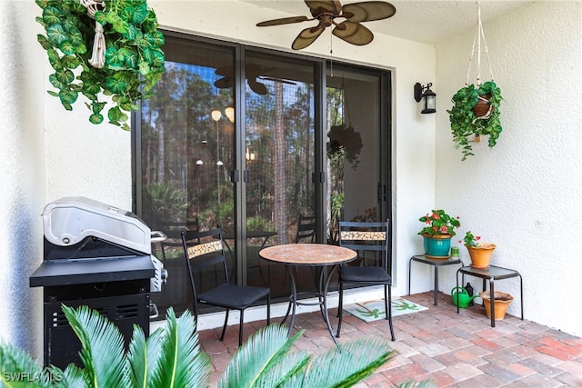 sunroom / solarium with ceiling fan