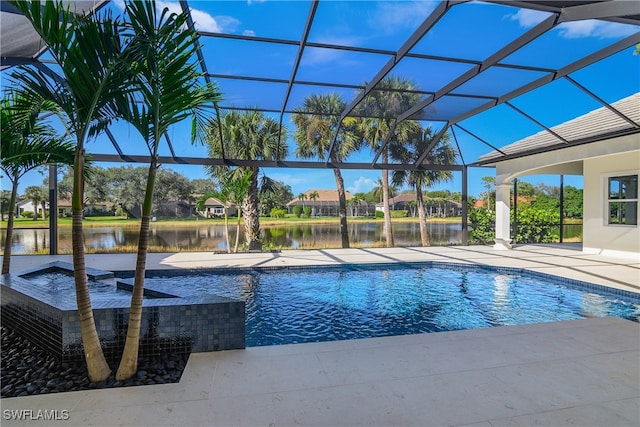 view of swimming pool with glass enclosure, a patio area, and a water view