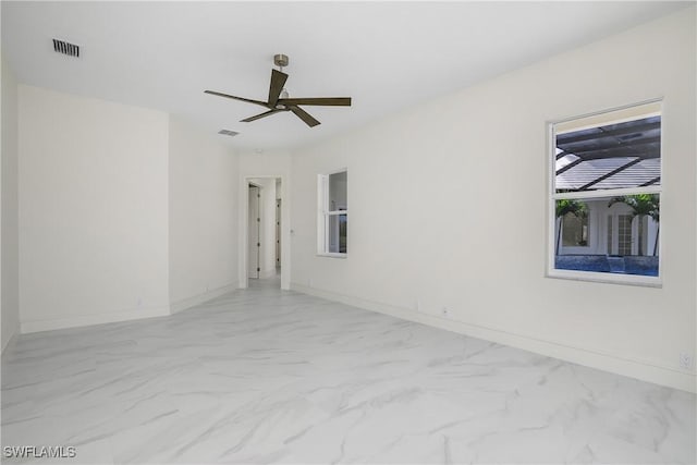 spare room featuring ceiling fan