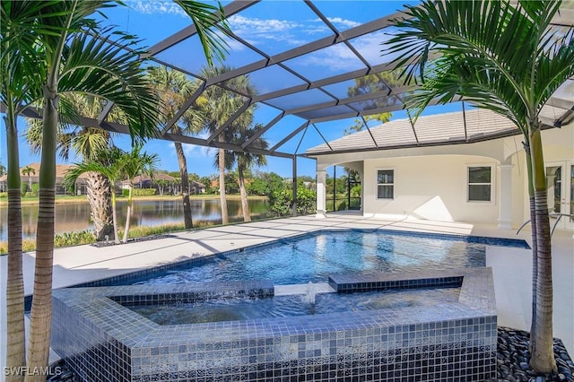 view of pool featuring an in ground hot tub, a water view, a patio area, and a lanai