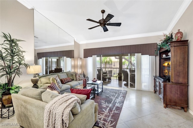 living room with ornamental molding and ceiling fan