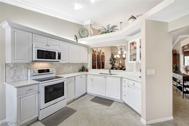 kitchen featuring white cabinetry, ornamental molding, light tile patterned flooring, sink, and white appliances