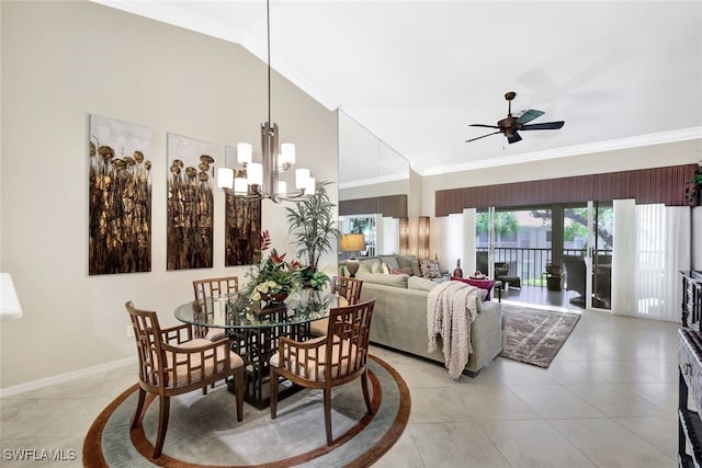 tiled dining space featuring lofted ceiling, ceiling fan with notable chandelier, and crown molding