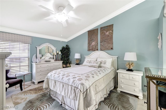 carpeted bedroom with ornamental molding, vaulted ceiling, and ceiling fan