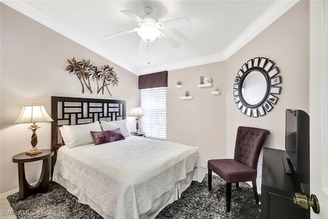 bedroom featuring ceiling fan and crown molding