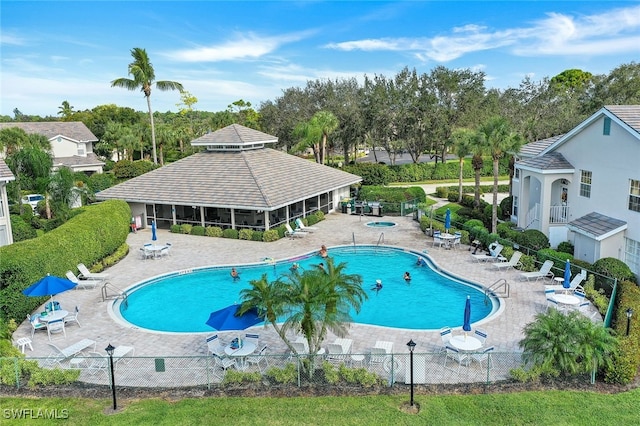 view of swimming pool featuring a patio