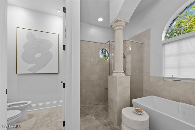 bathroom with separate shower and tub, ornate columns, a bidet, and toilet