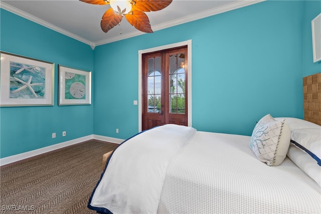 bedroom featuring ornamental molding, carpet flooring, and ceiling fan