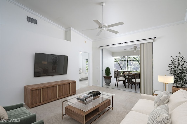 living room featuring ceiling fan, light colored carpet, high vaulted ceiling, and ornamental molding