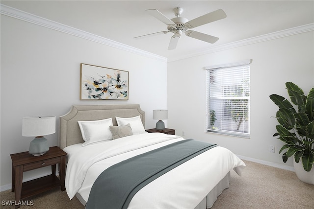 bedroom with carpet floors, ceiling fan, and crown molding