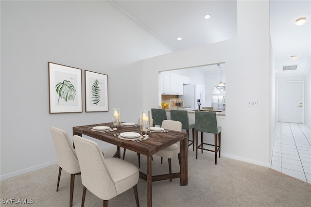 view of carpeted dining space