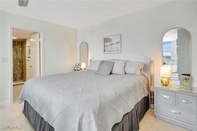 tiled bedroom featuring connected bathroom