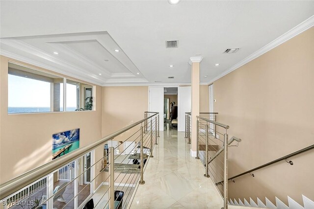 hallway featuring ornamental molding