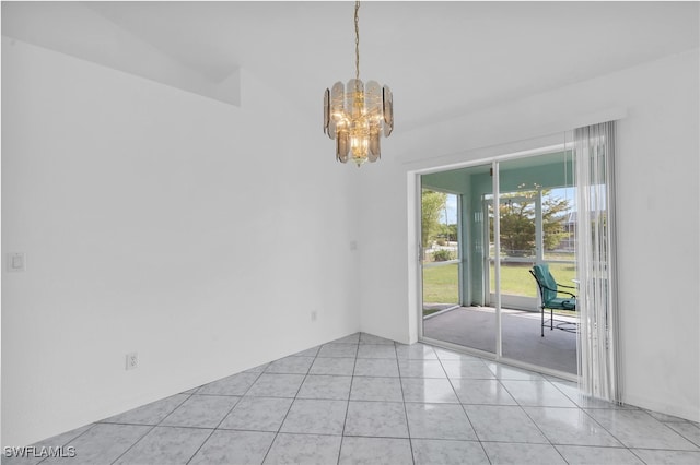 interior space with light tile patterned flooring and an inviting chandelier