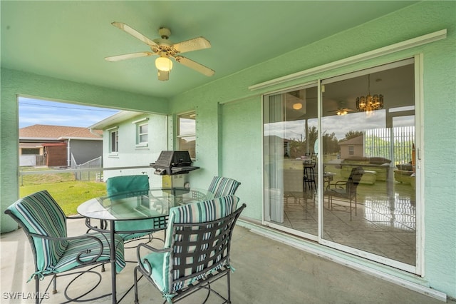 sunroom / solarium with ceiling fan