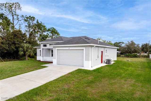 single story home featuring a front lawn, central AC unit, and a garage