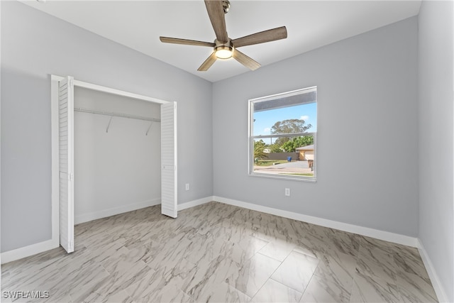 unfurnished bedroom featuring a closet and ceiling fan