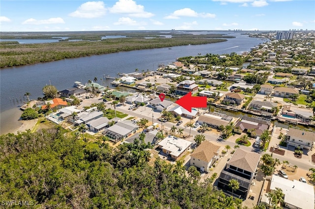 bird's eye view with a water view