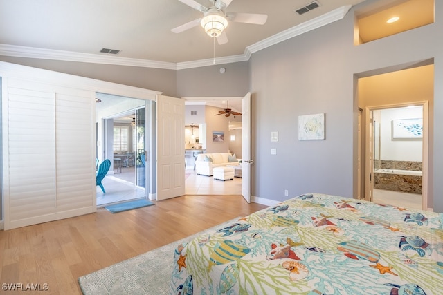 bedroom featuring crown molding, access to exterior, vaulted ceiling, light hardwood / wood-style floors, and ceiling fan