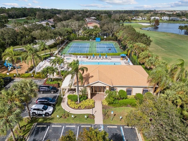 birds eye view of property featuring a water view