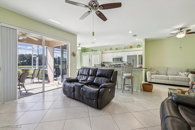 living room with light tile patterned floors