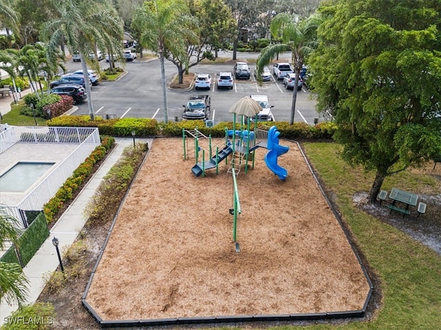 surrounding community featuring a playground