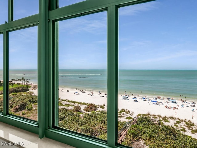 property view of water featuring a beach view