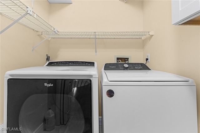 laundry area featuring washer and clothes dryer