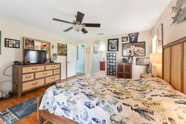 bedroom featuring dark wood-type flooring and ceiling fan