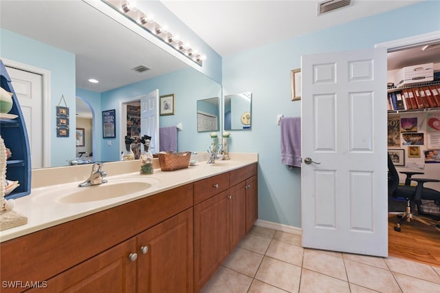 bathroom featuring vanity and tile patterned floors