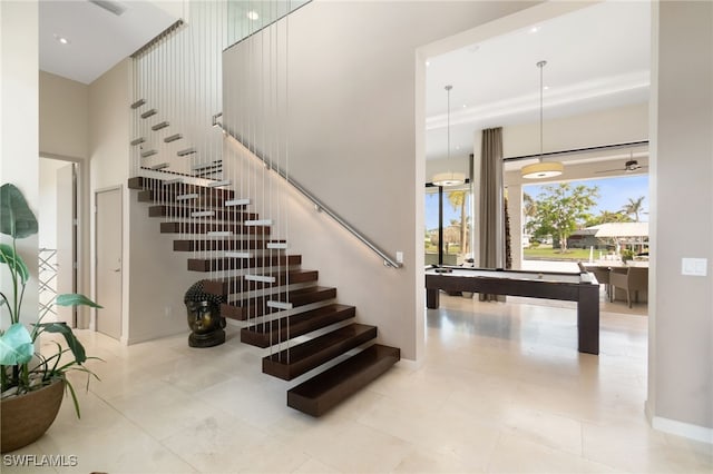 stairway featuring pool table