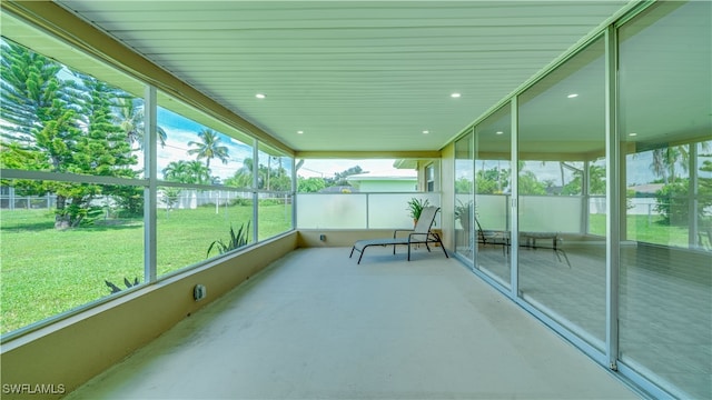 unfurnished sunroom with plenty of natural light