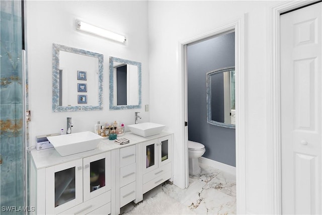9801 Boraso Way Unit 103, Fort Myers, FL 33908 - bathroom featuring marble look tile flooring and double vanity
