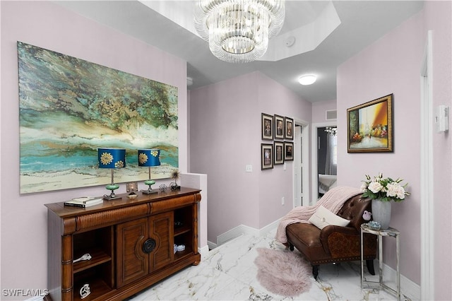 9801 Boraso Way Unit 103, Fort Myers, FL 33908 - living area with light marble finish floors and a chandelier