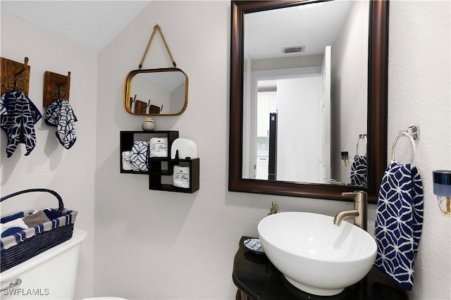 9801 Boraso Way Unit 103, Fort Myers, FL 33908 - half bath featuring toilet and vanity