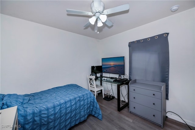 bedroom featuring ceiling fan and hardwood / wood-style flooring