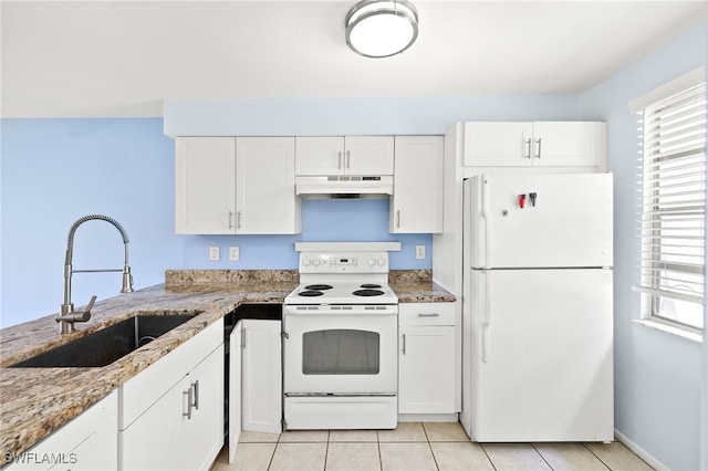 kitchen featuring white appliances, light stone countertops, white cabinetry, and sink