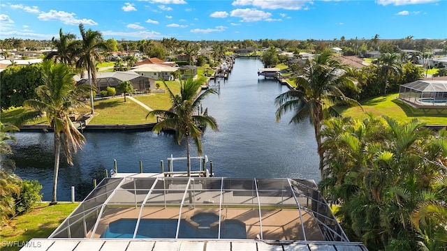 birds eye view of property featuring a water view