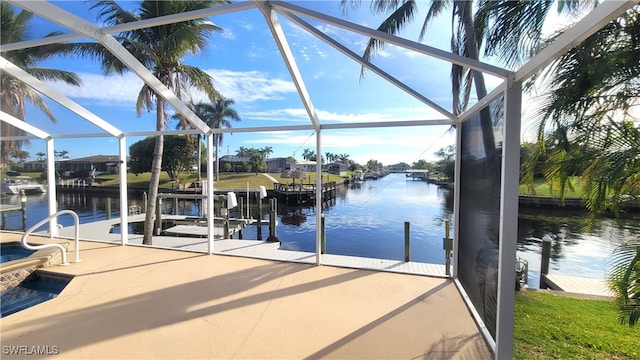 dock area with a water view and a lanai