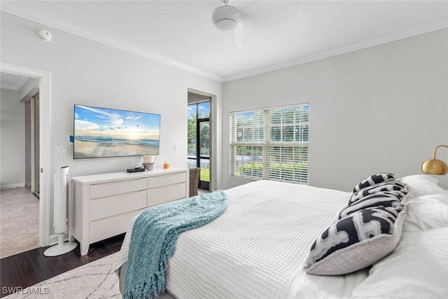 bedroom with ornamental molding, access to outside, ceiling fan, and dark hardwood / wood-style floors