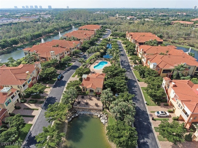 drone / aerial view with a water view