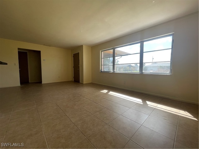 view of tiled spare room