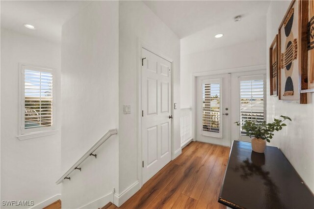 270 Delmar Ave, Fort Myers Beach, FL 33931 - hallway with wood finished floors and recessed lighting