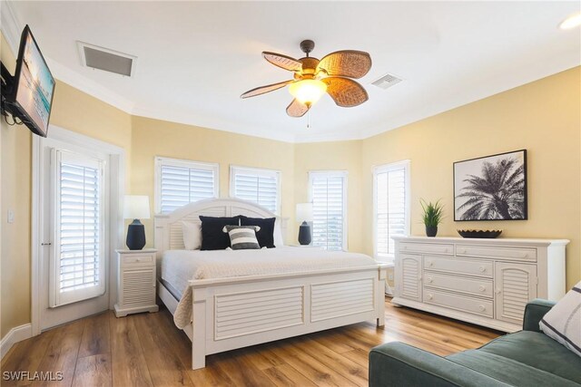 270 Delmar Ave, Fort Myers Beach, FL 33931 - bedroom with light wood-style floors, crown molding, ceiling fan, and baseboards