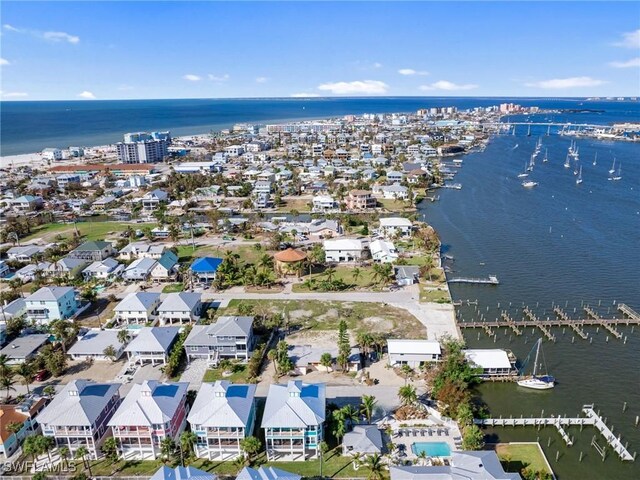 270 Delmar Ave, Fort Myers Beach, FL 33931 - aerial view of property and surrounding area with a large body of water and nearby suburban area