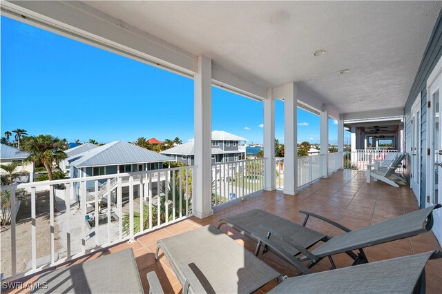 270 Delmar Ave, Fort Myers Beach, FL 33931 - view of patio featuring a balcony and a residential view