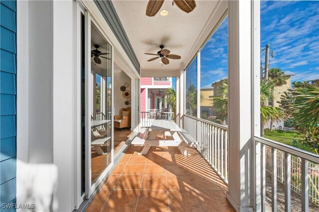 270 Delmar Ave, Fort Myers Beach, FL 33931 - balcony featuring a ceiling fan