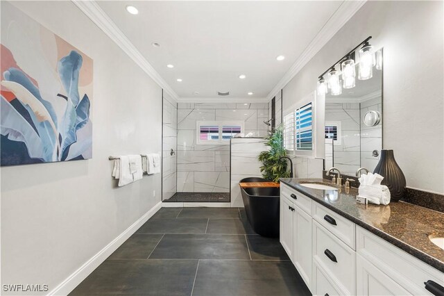 270 Delmar Ave, Fort Myers Beach, FL 33931 - bathroom with a stall shower, double vanity, a freestanding tub, ornamental molding, and recessed lighting